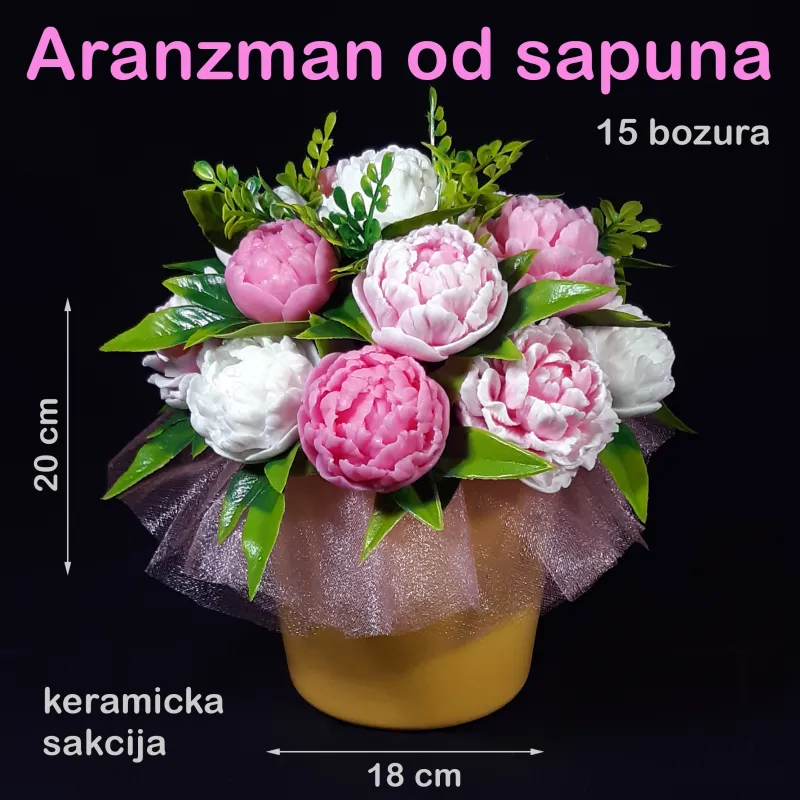 Roze božuri u keramičkoj saksiji
